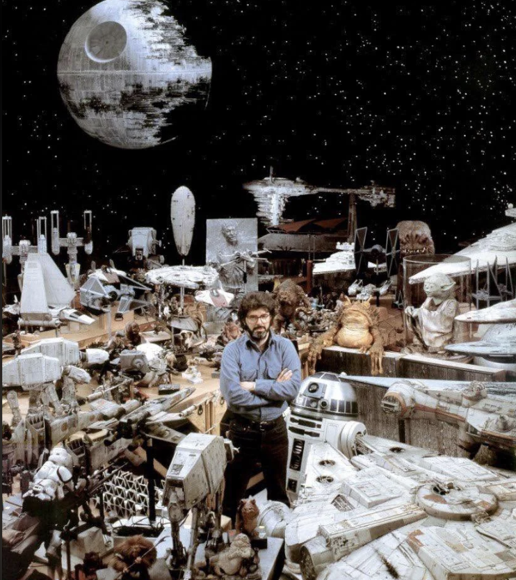 george lucas with star wars props
